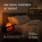Flame diffuser as a soft night light beside a bed in a dark bedroom