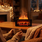 Person holding a warm mug next to a flame diffuser on a coffee table on a cozy autumn evening